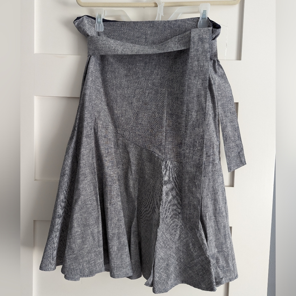Flirty asymmetrical skirt with removable tie wrap